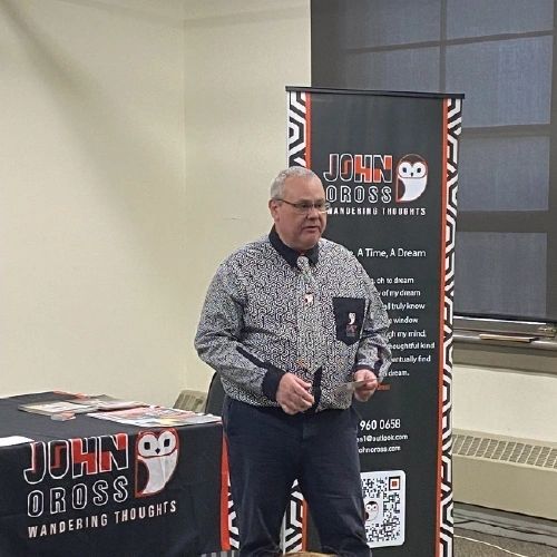 John Oross speaking at an author event